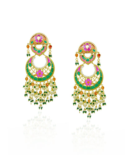 Colorful meenakari earrings with pink, green, and orannge accents on a white background handcrafted in silver with gold plating.