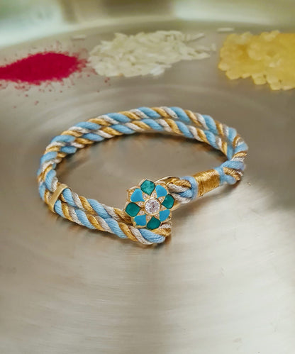 Floral sterling silver Rakhi with handcrafted silk thread