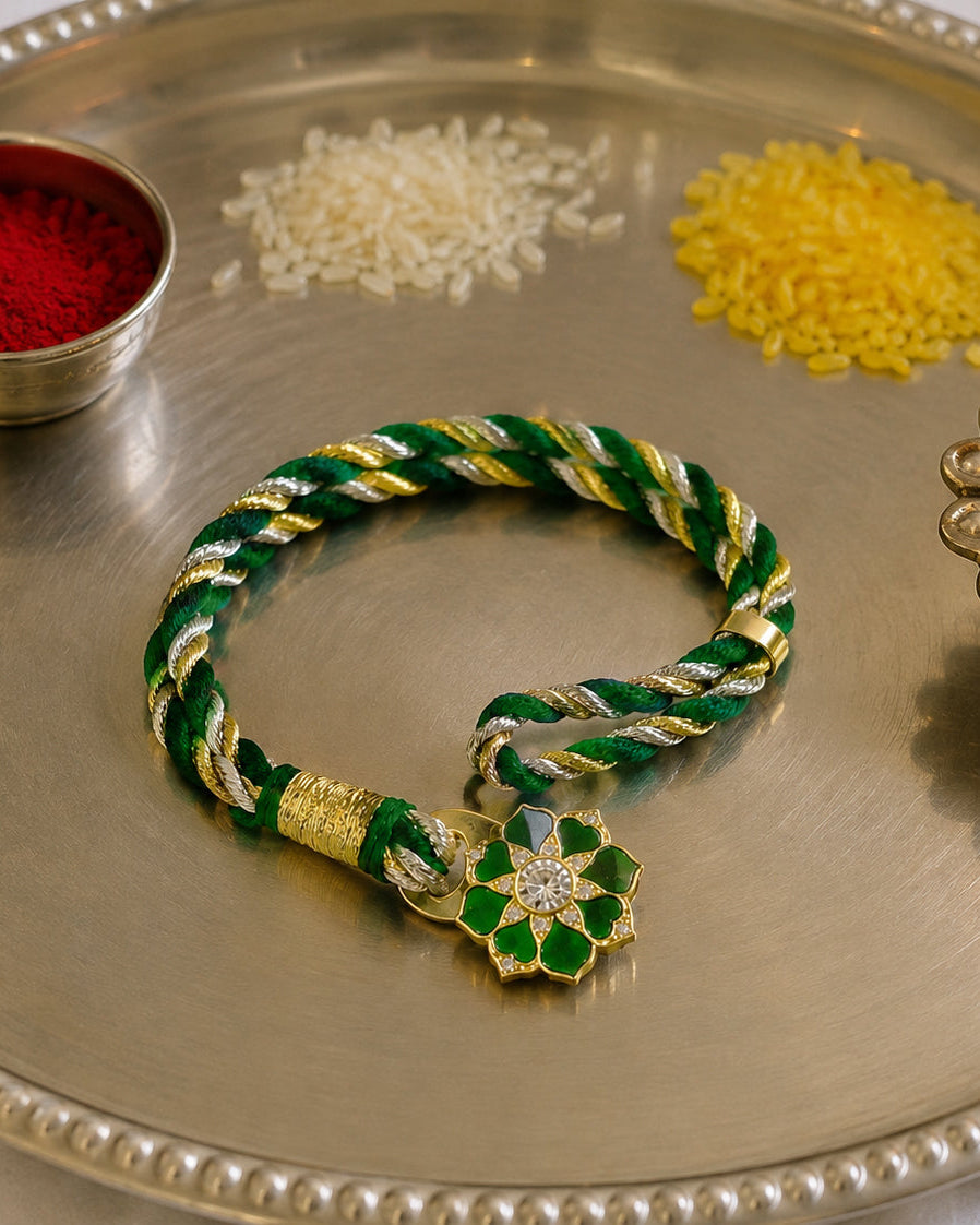 Handcrafted 925 silver floral Rakhi with silk and zari dori