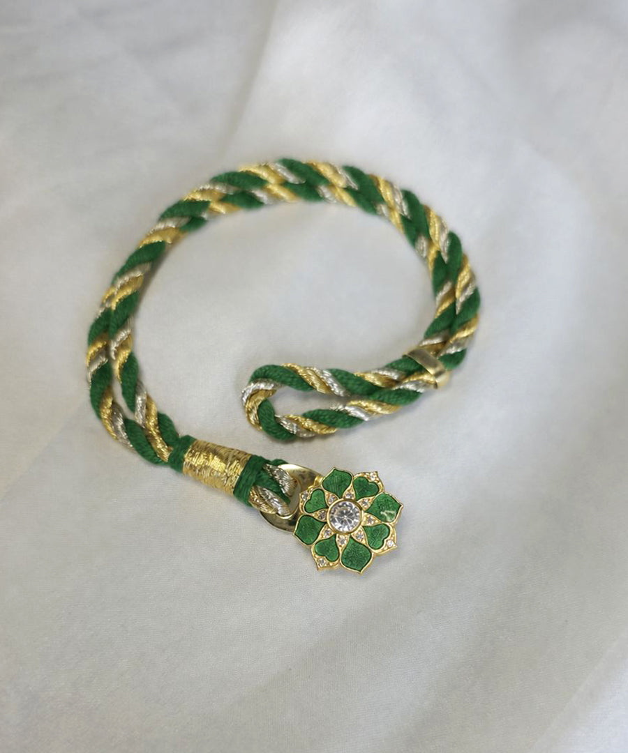 Festive 925 silver floral Rakhi bracelet handcrafted with traditional detailing.