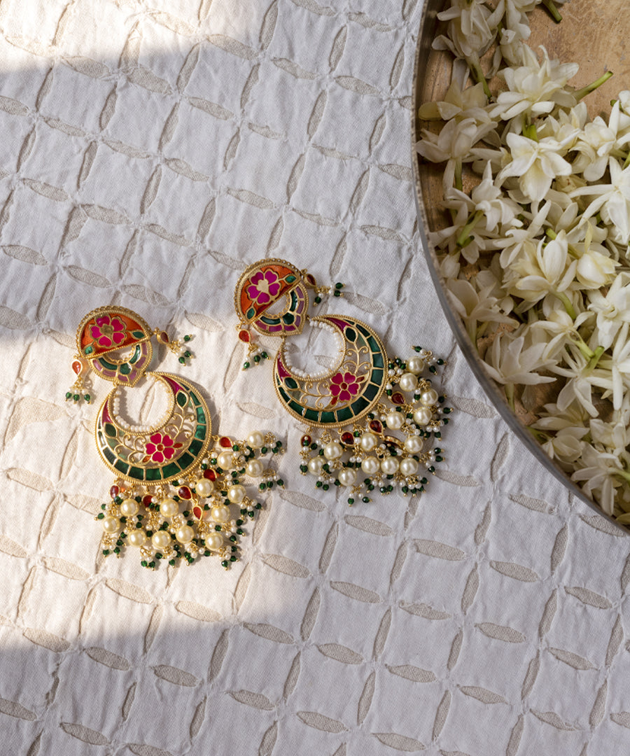 Festive gold-plated 925 silver chandbali earrings featuring woven pearls and colorful meenakari detailing.