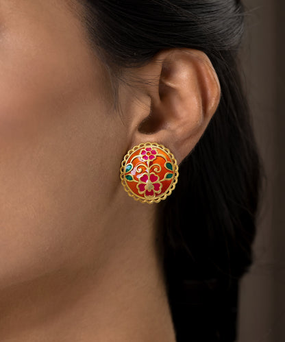 Handcrafted 925 sterling silver Meenakari stud earrings with colorful enamel and gold-plated finish.