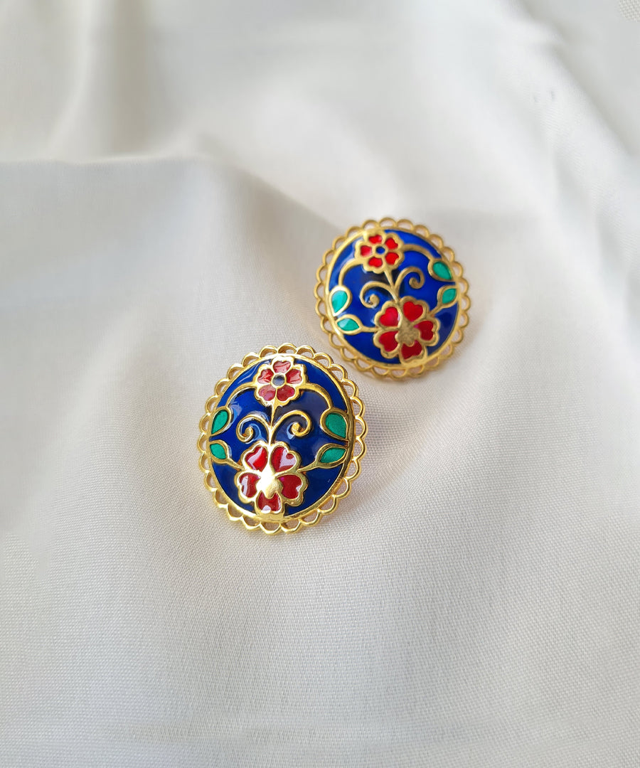 Pair of 925 silver stud earrings with floral designs enamel work with gold plating.
