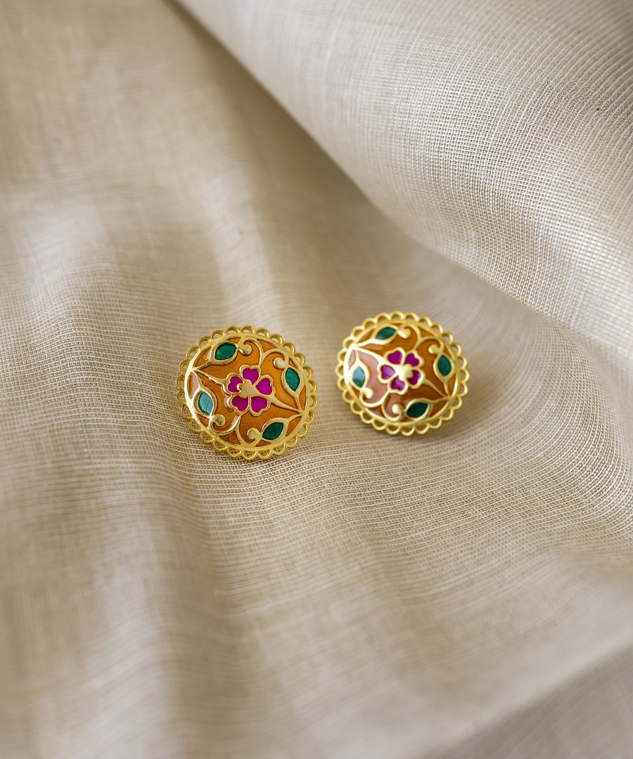 Minimal gold-plated silver stud earrings with handcrafted Meenakari design inspired by punjab heritage.