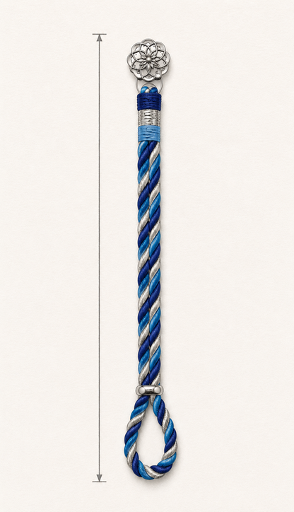 A blue, white, braided rakhi bracelet with a 925 silver floral motif finial on one end and a matching loop.
