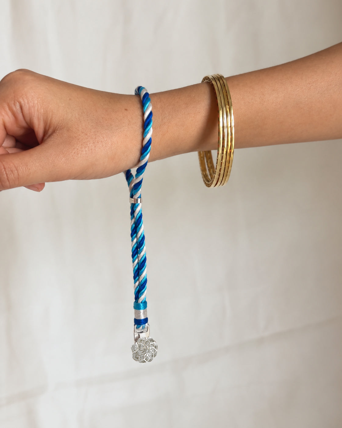 Sterling silver Rakhi bracelet for Bhabhi, handcrafted as a wearable keepsake.