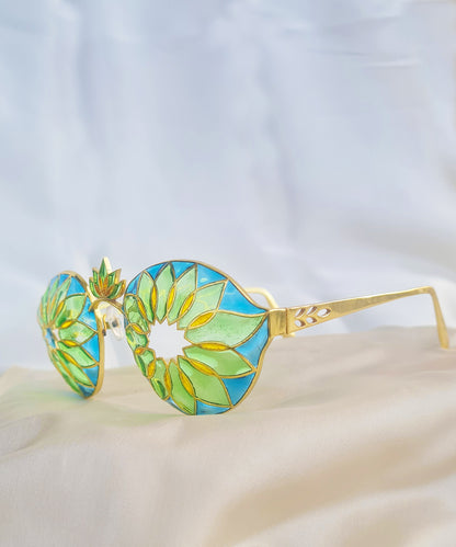 Daizy Barati Eye Wear — Kaleidoscope collection, Manner India, transparent Meenakari enamel blue green yellow, thick gold finish, handcrafted Jaipur