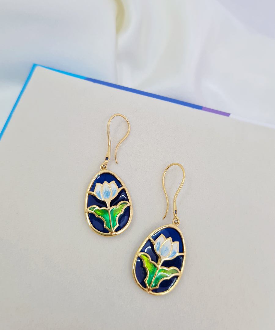 925 sterling silver, gold-plated lotus hook earrings featuring handcrafted meenakari work.