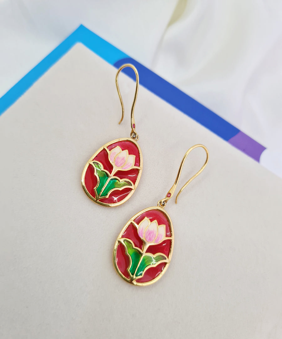 Handcrafted 925 silver gold-plated lotus hook earrings inspired by traditional Indian artistry.