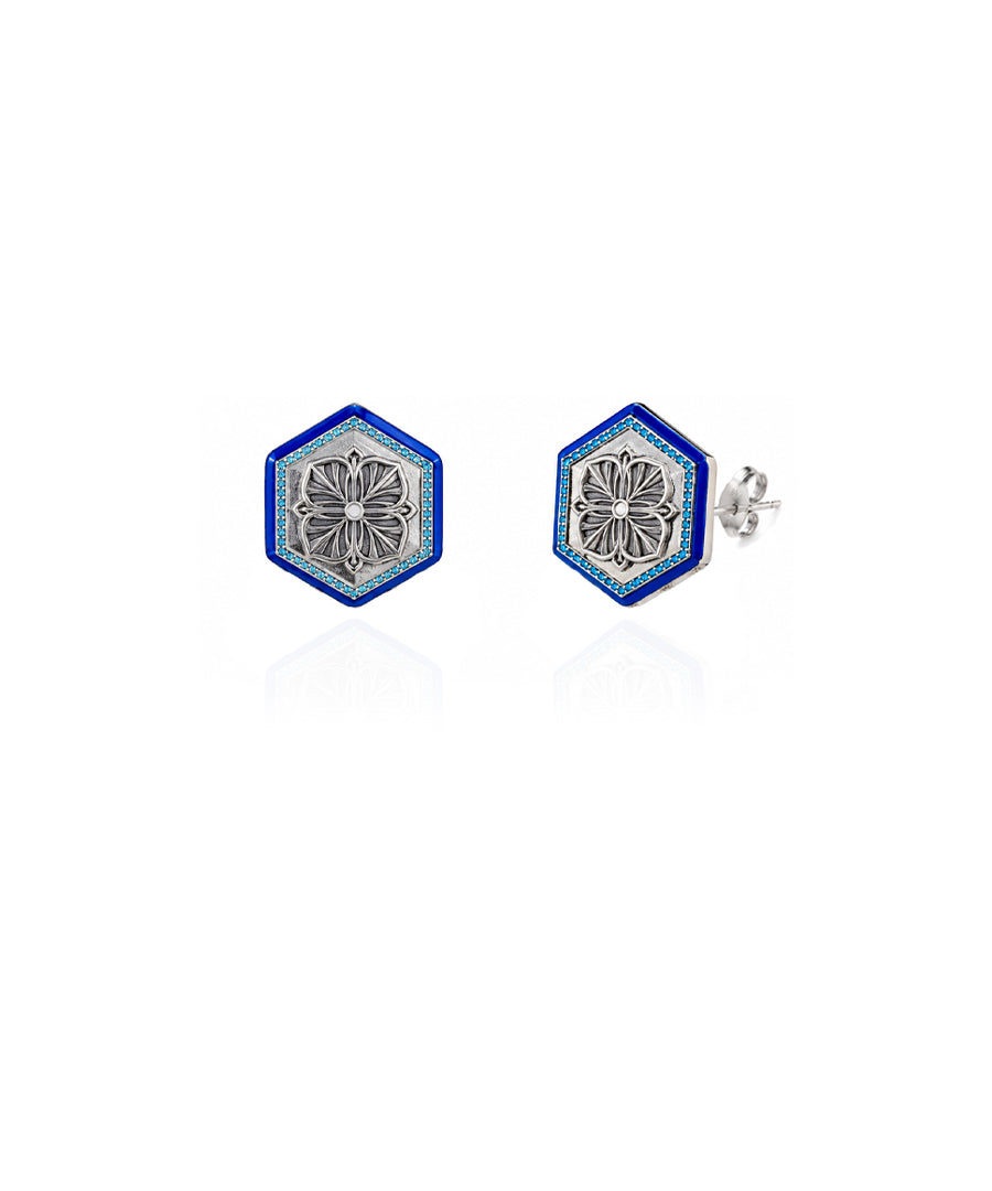 Elegant blue Magnolia stud earrings with a delicate floral design.