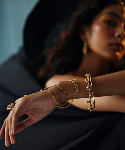 Model wearing hand accessories from scent of thar collection by manner.