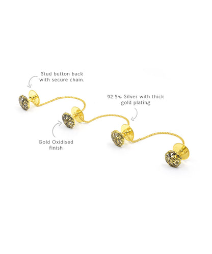Stud button back with secure chain.