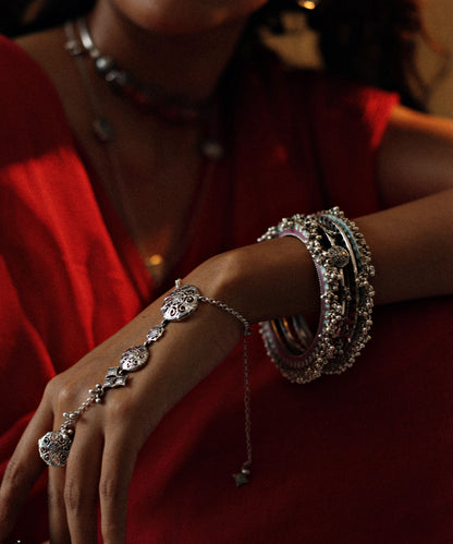 Adjustable layered chain bracelet in sterling silver.