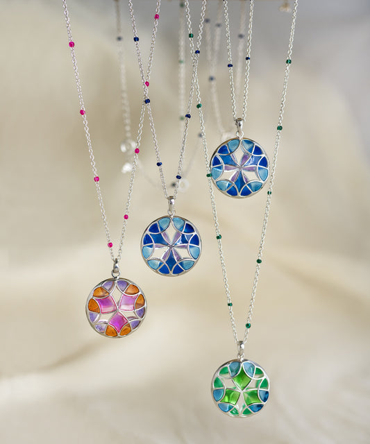 Fashionable necklaces make a statement with bold chain necklaces and delicate pandants.