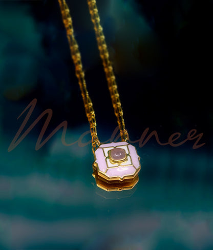 Enameled long chain necklace with rose quartz gemstone.